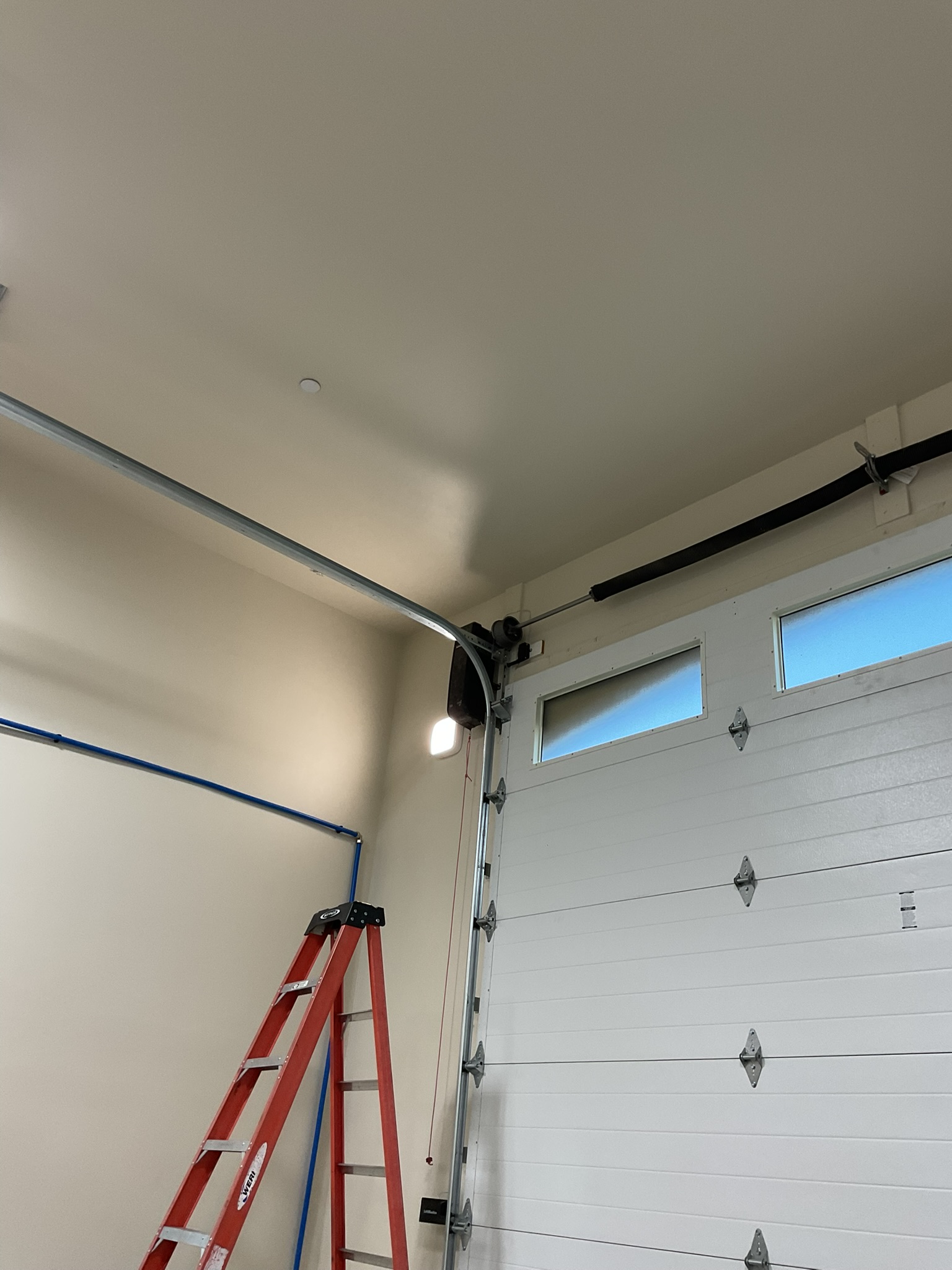 Garage Door Springs and Opener Replacement to LiftMaster Jackshaft for an RV garage door.