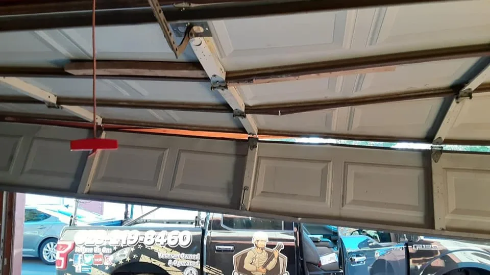 What Should You Do If You Need A Garage Door Track Repair?