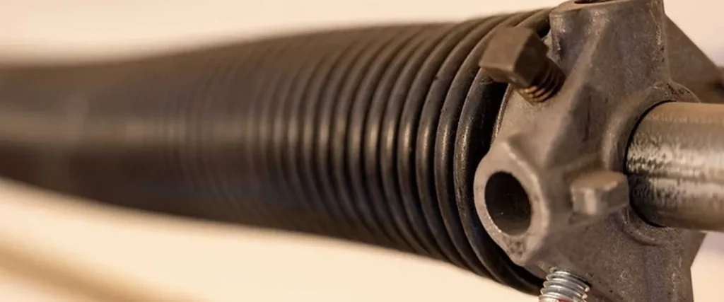 How Does A Garage Door Company Fix A Broken Garage Door Spring?