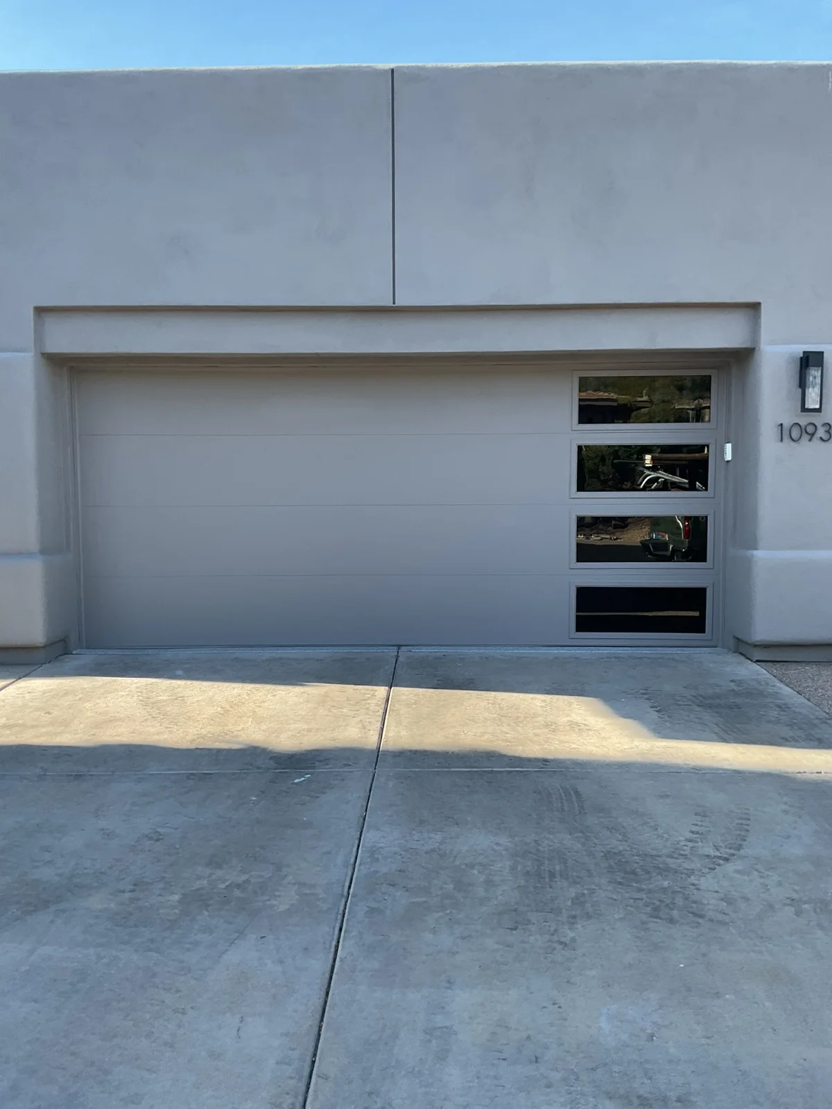 Garage door with window panels in Surprise, AZ