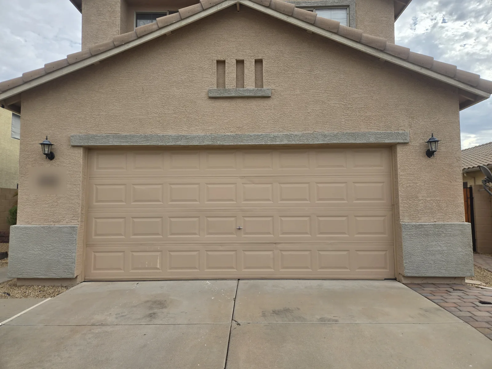 Before: the old garage door on the same North Phoenix, AZ home