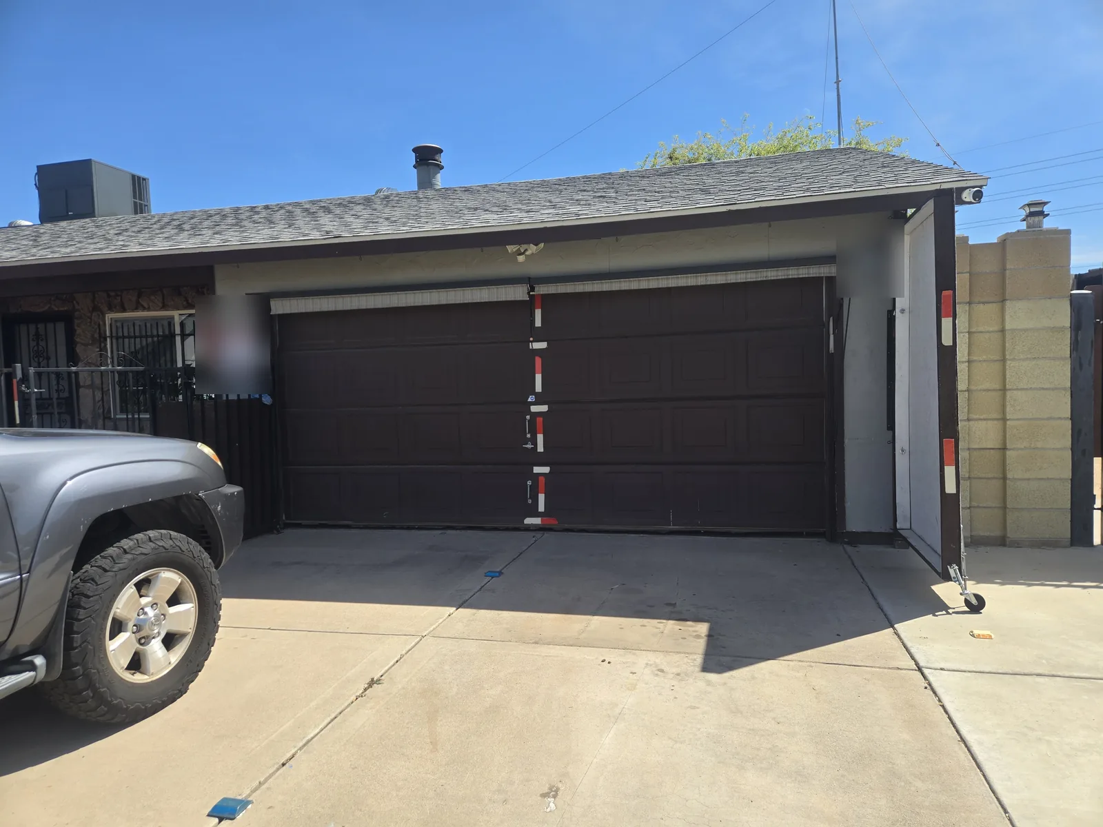 Before: the old garage door on the same North Phoenix, AZ home