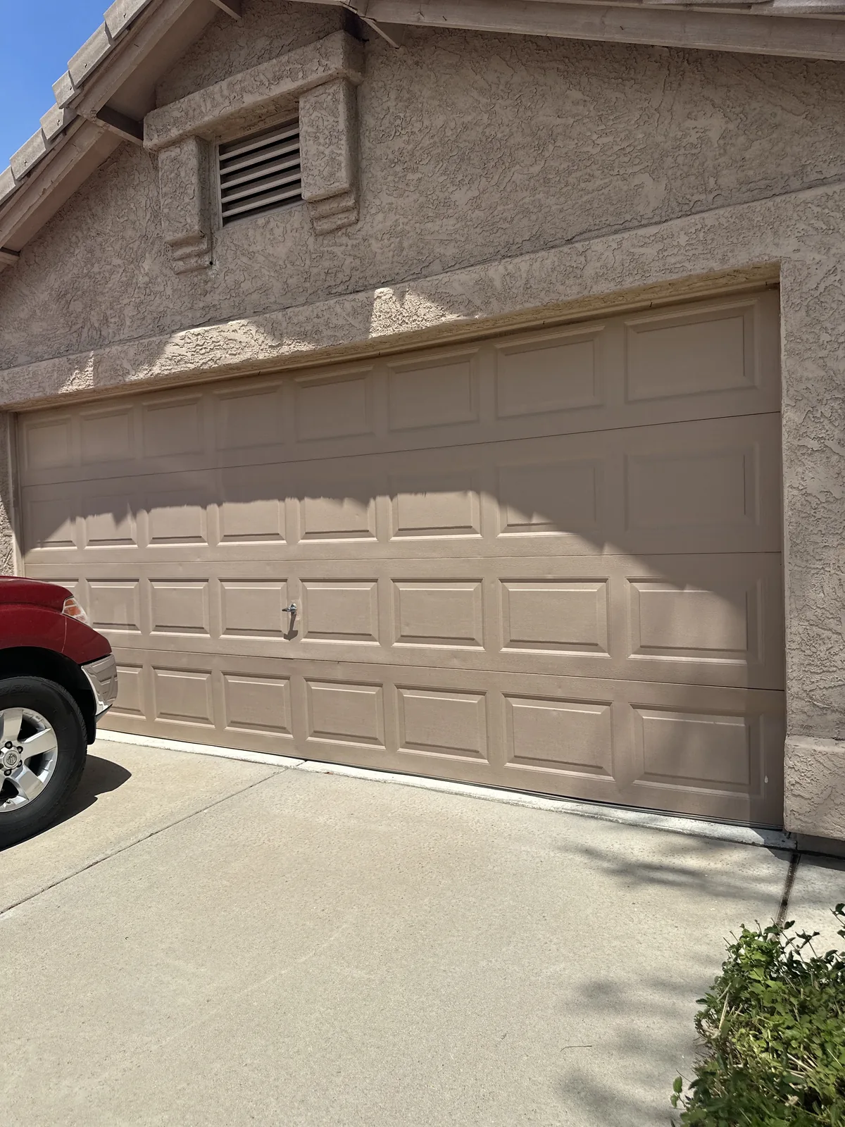Before: the old garage door on the same North Phoenix, AZ home