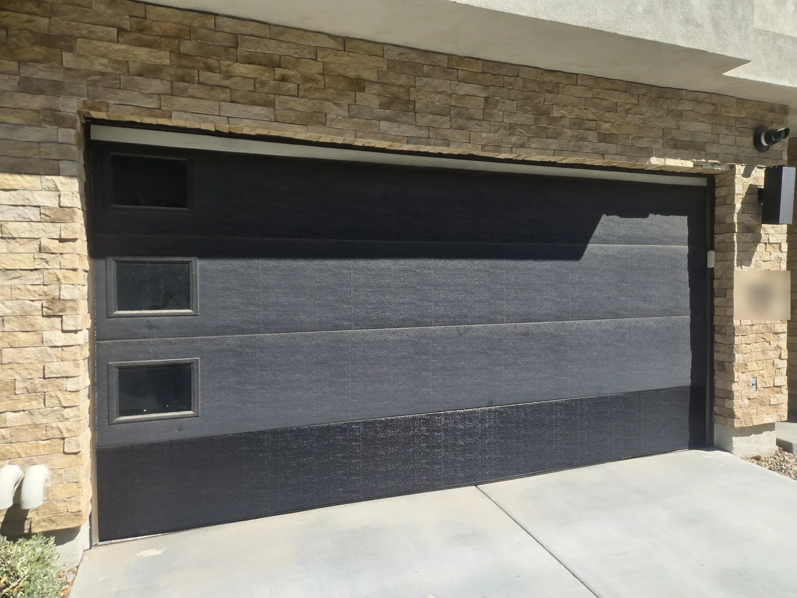 Before: the old garage door on the same Scottsdale, AZ home