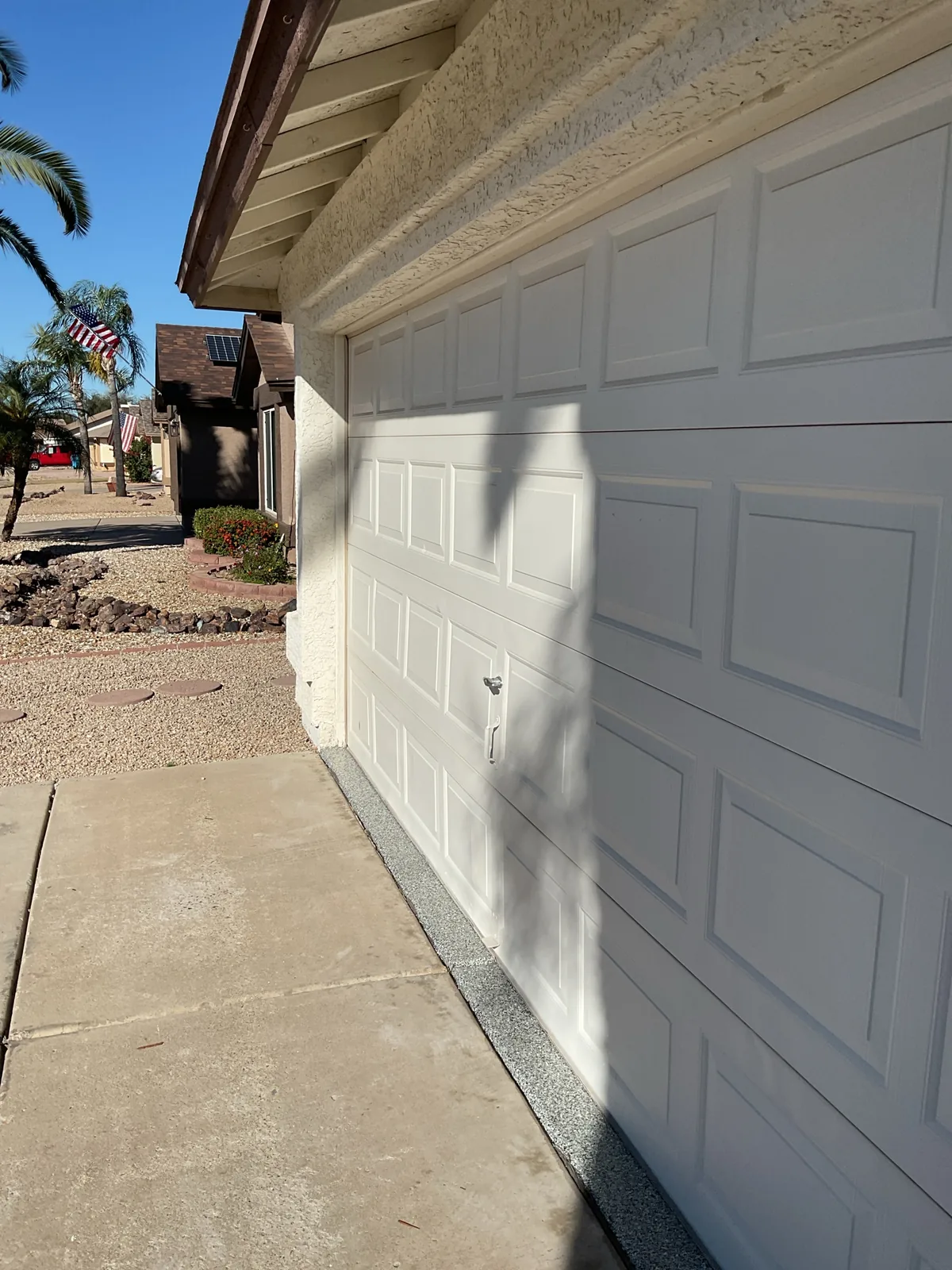 Before: the old garage door on the same North Phoenix, AZ home